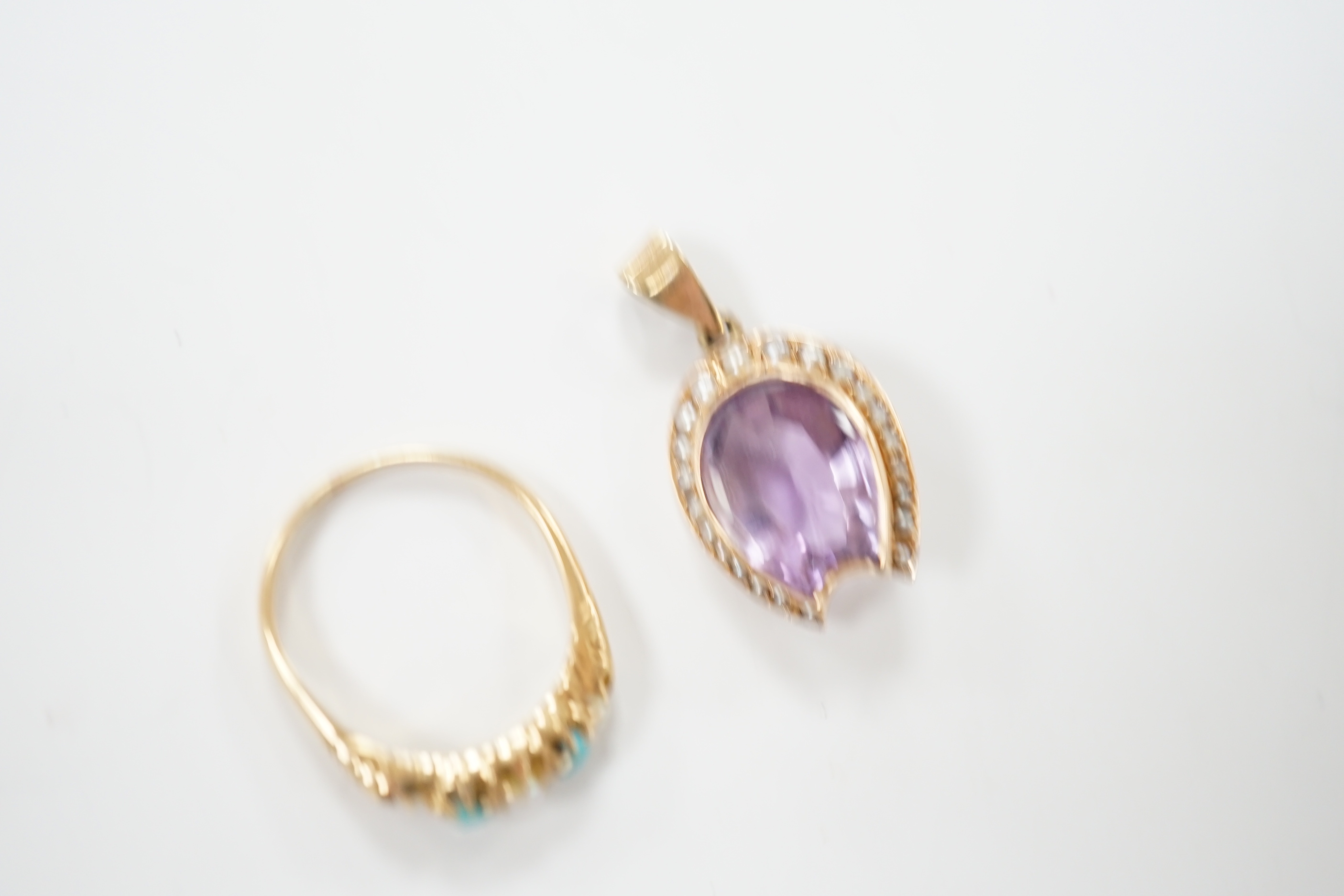 An early 20th century yellow metal and graduated split pearl and turquoise set half hoop ring, size M together with a yellow metal and amethyst set pendant, gross weight 5.6 grams.